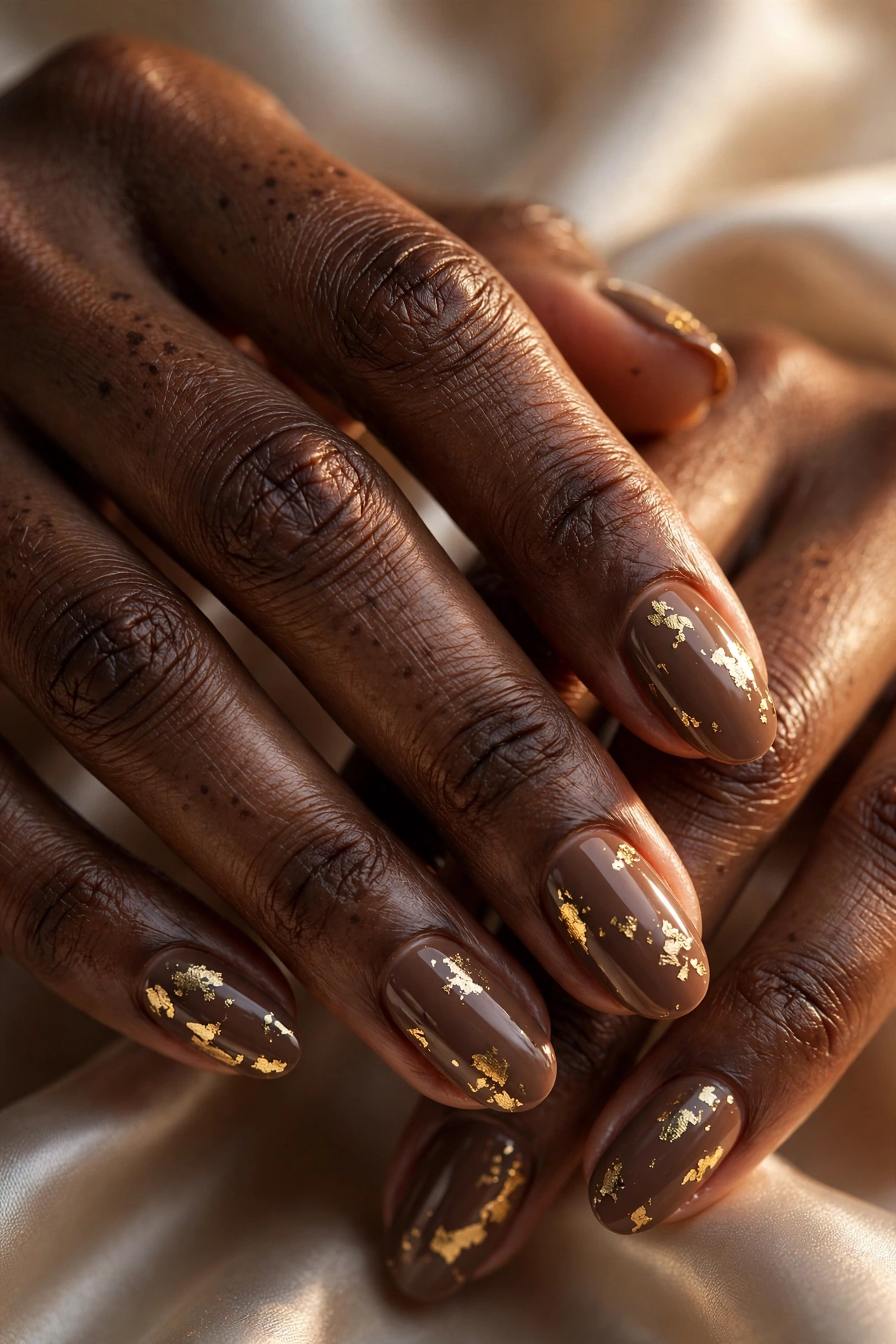 Mocha nails with gold foil accents