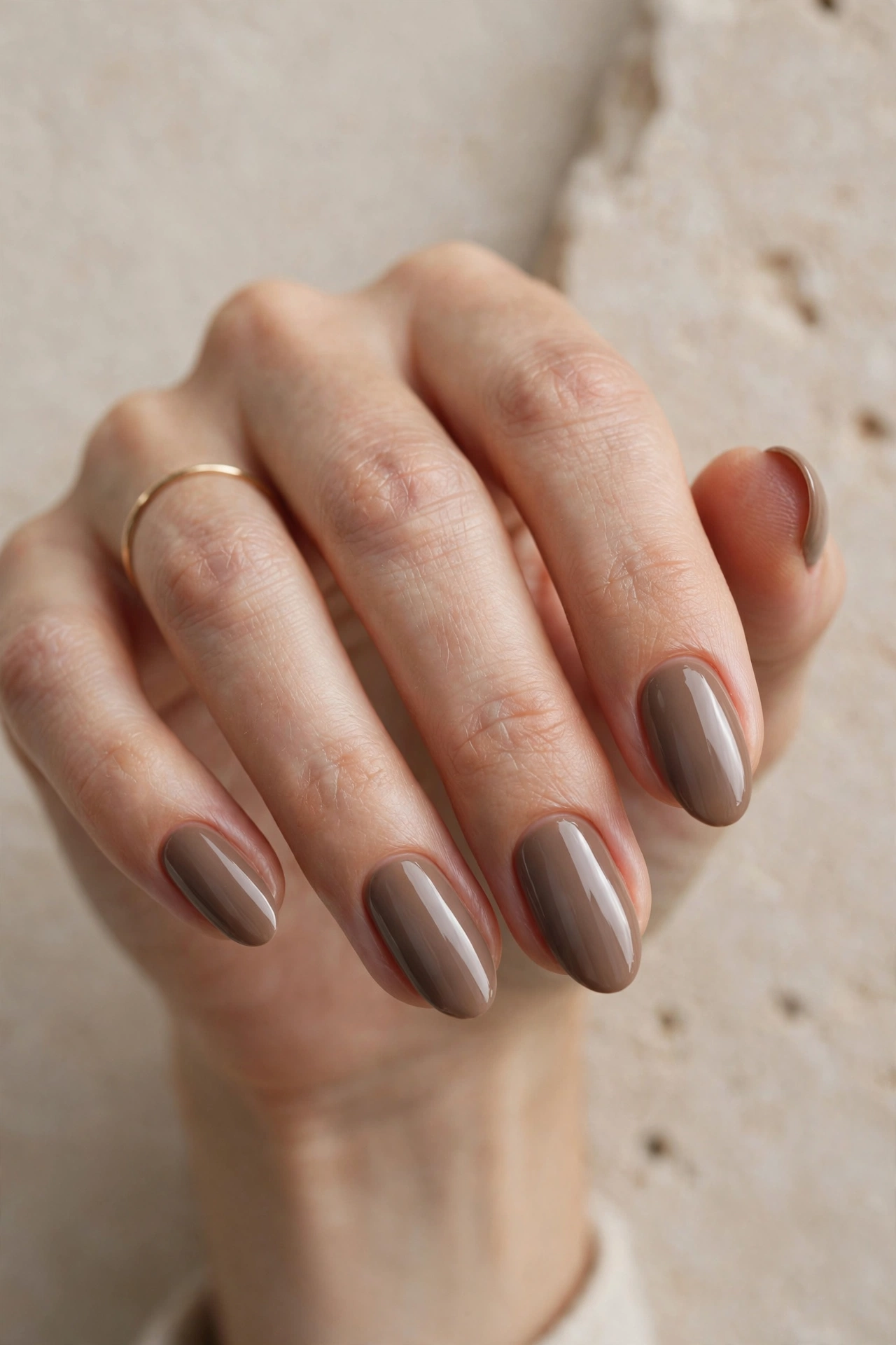 Warm taupe glossy nails