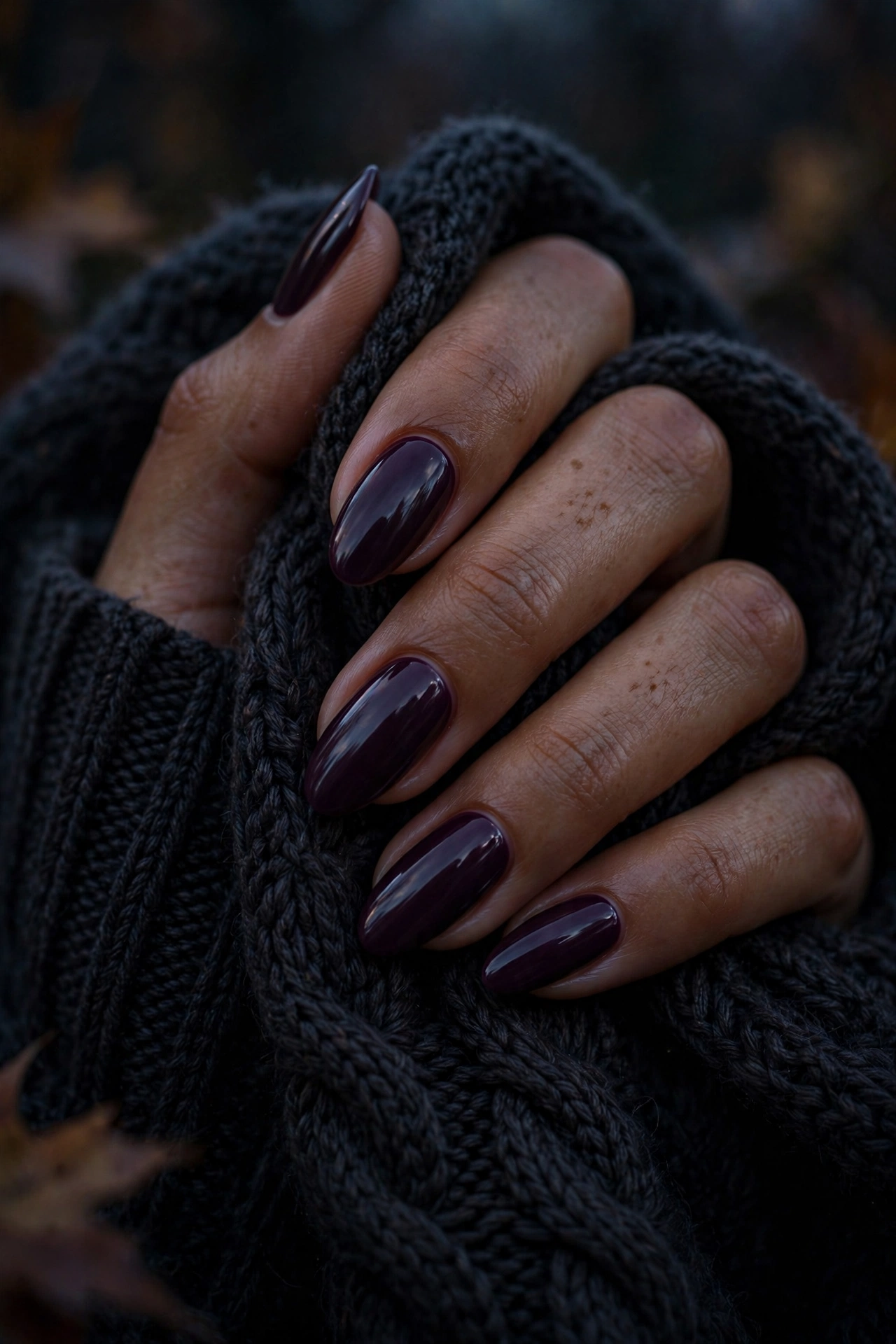 Deep plum glossy nails